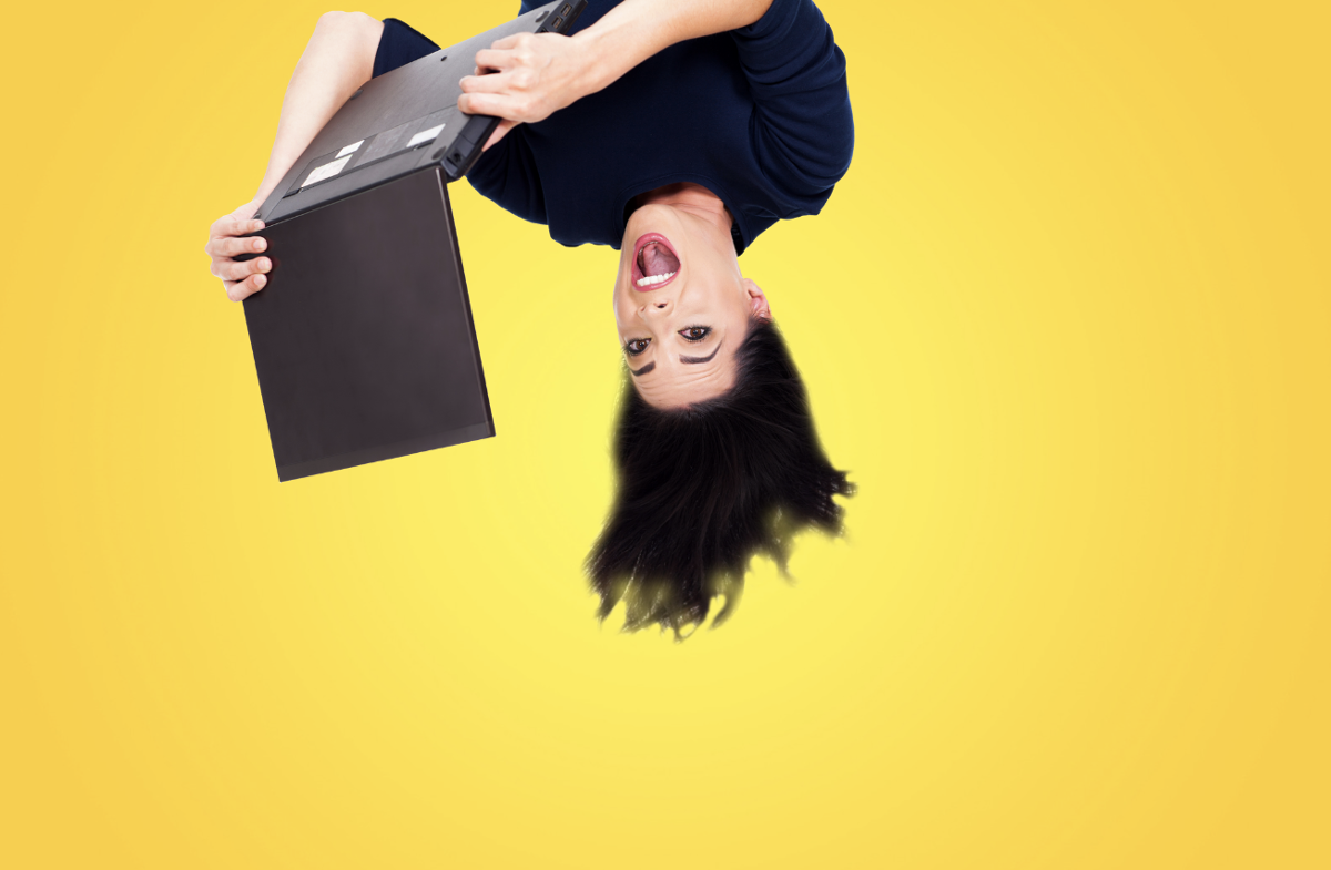 woman upside down with laptop